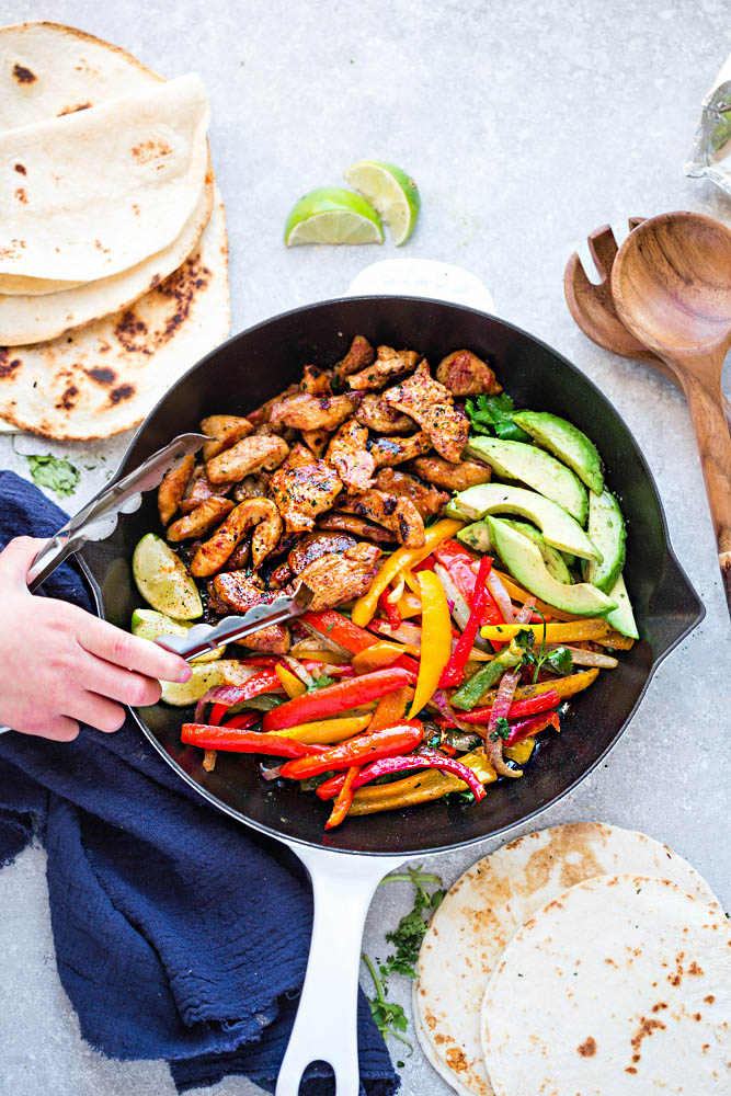 Low Carb Chicken Fajitas - a quick, simple and tasty one pan meal with minimal clean-up. Just 30 minutes and perfect for busy weeknights. Serve over a bed of lettuce, cauliflower rice or with keto wraps