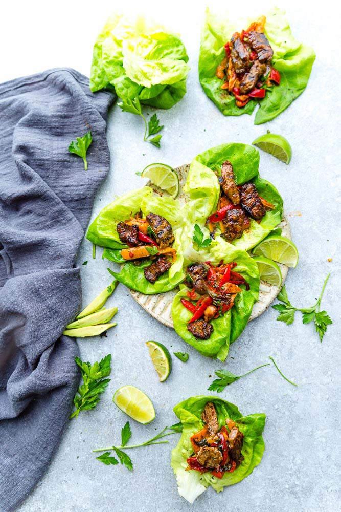 Stake Fajita Lettuce Wraps – fresh, flavorful and a healthier way to enjoy tacos or fajias! Less than 30 minutes to make with a homemade seasoning and perfect for lunch or a lightened up dinner for busy weeknights! They are also gluten free, low carb, Keto and Paleo friendly, whole 30 compliant and a healthy meal for your own Cinco de Mayo or Mexican fiesta