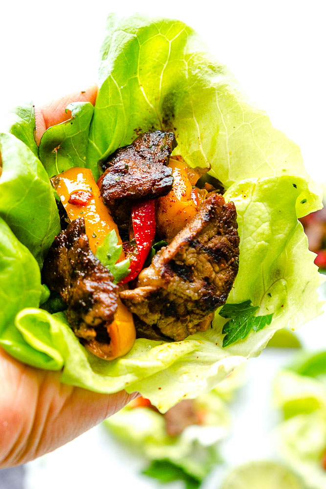 These Chili Lime Steak Fajita Lettuce Wraps are fresh, flavorful and super easy to make! They make the perfect handheld appetizers or a light and healthy low-carb lunch or dinner!