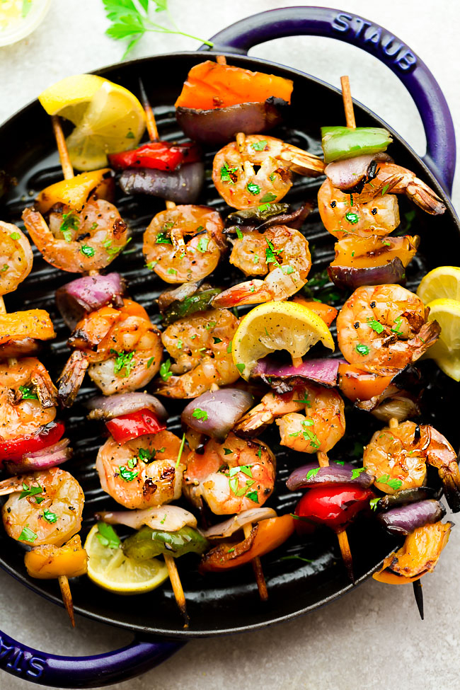 Grilled Lemon Shrimp Skewers with Vegetables coated with a buttery garlic lemon sauce. Low carb, keto and perfect for patio season.
