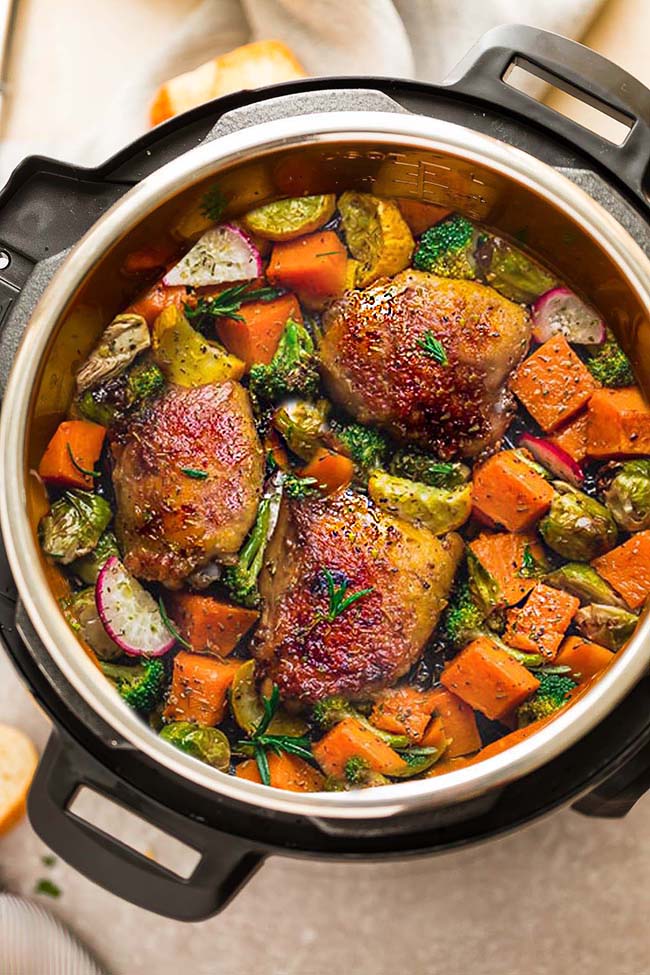 This Instant Pot Chicken with Autumn Vegetables if full of cozy fall flavors and perfect for busy weeknights. Made with tender, juicy chicken thighs, Brussels sprouts, pumpkin and broccoli.
