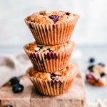 Stack of 3 low carb blueberry lemon muffins